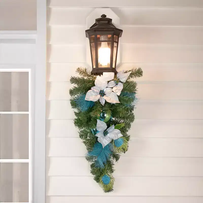 Northlight Peacock Feather and Poinsettia Artificial Christmas Teardrop Swag - 22 - Unlit