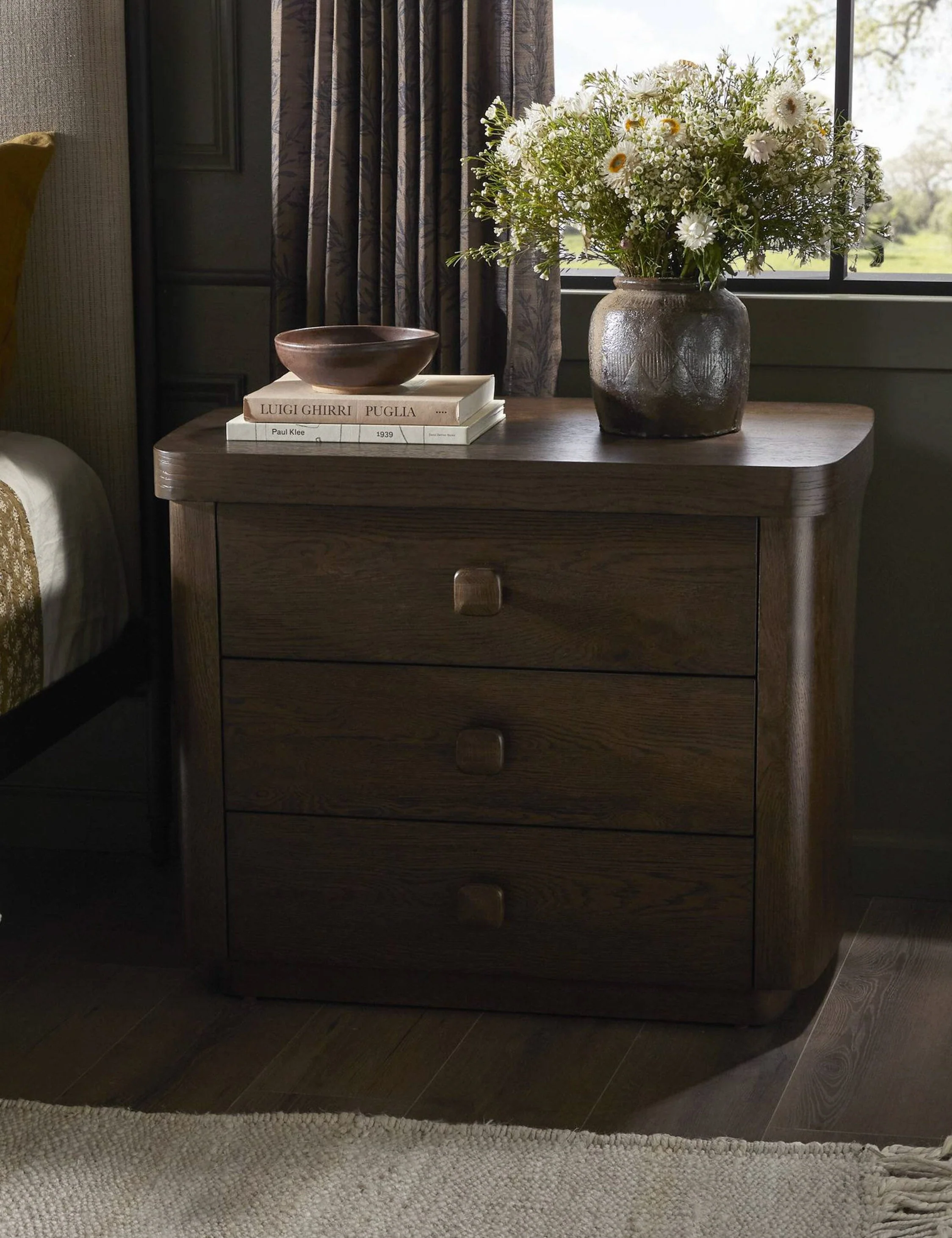 Nightstand - Rooted in sculptural simplicity, the nightstand offers a bold presence with a modern feel