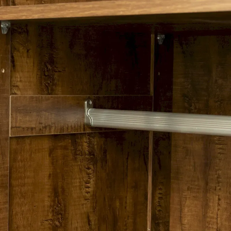 Armoire-penderie en bois blanc avec portes, tiroirs et tringle.