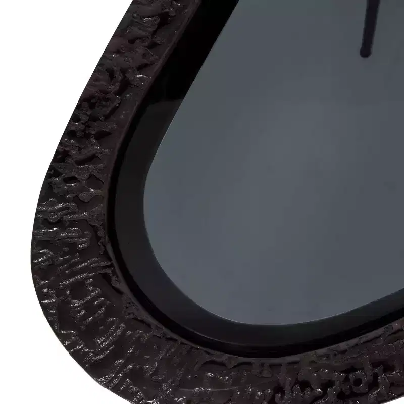 Olivia & May Aluminum Abstract Oval Shaped End Table with Shaded Glass Top Black